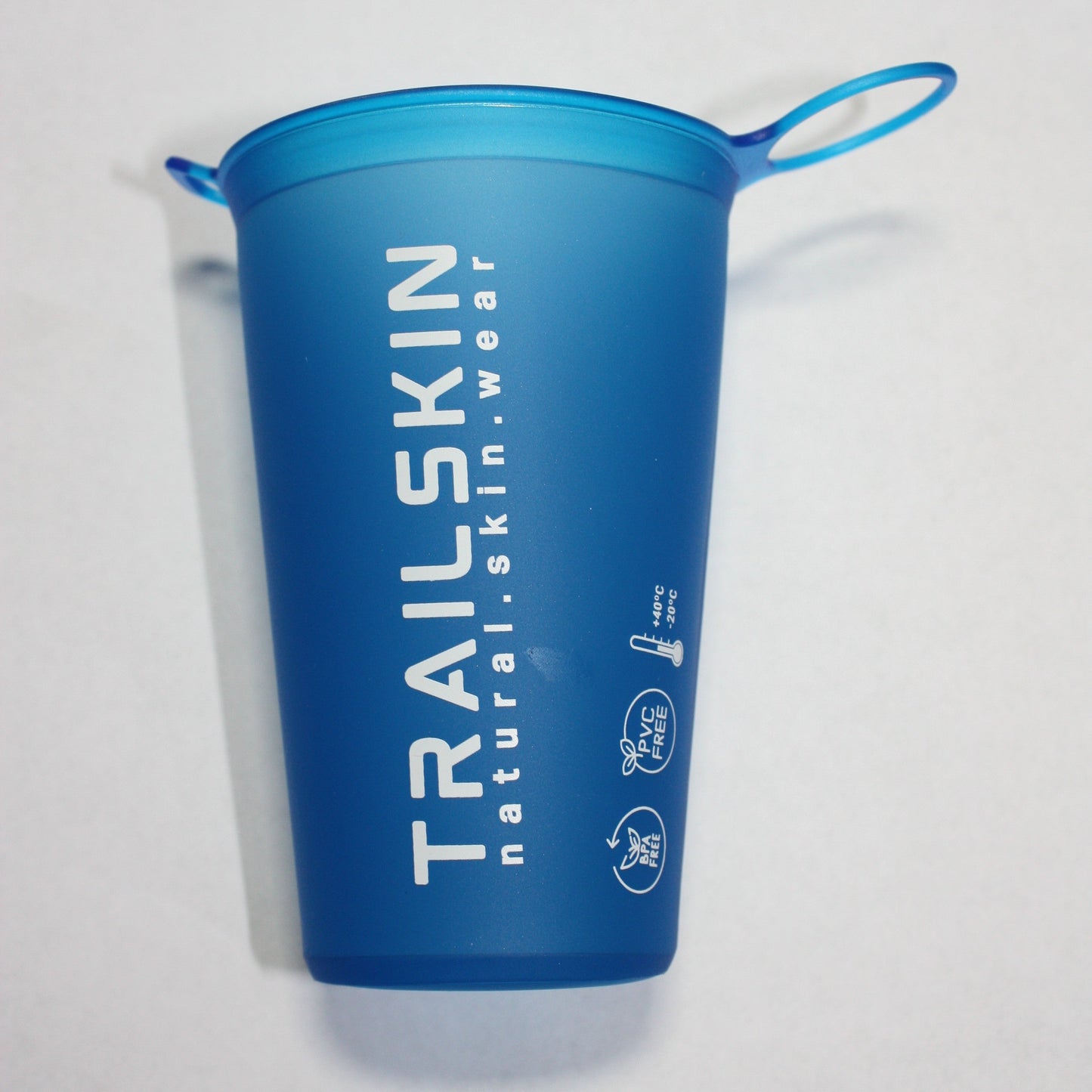 Blue water bottle with 'TRAILSKIN' branding on a white background